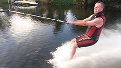 Patient, Matt Ellis water skiiing 12 weeks after his first total knee replacement.