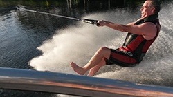 Patient, Matt Ellis water skiiing 12 weeks after his first total knee replacement.